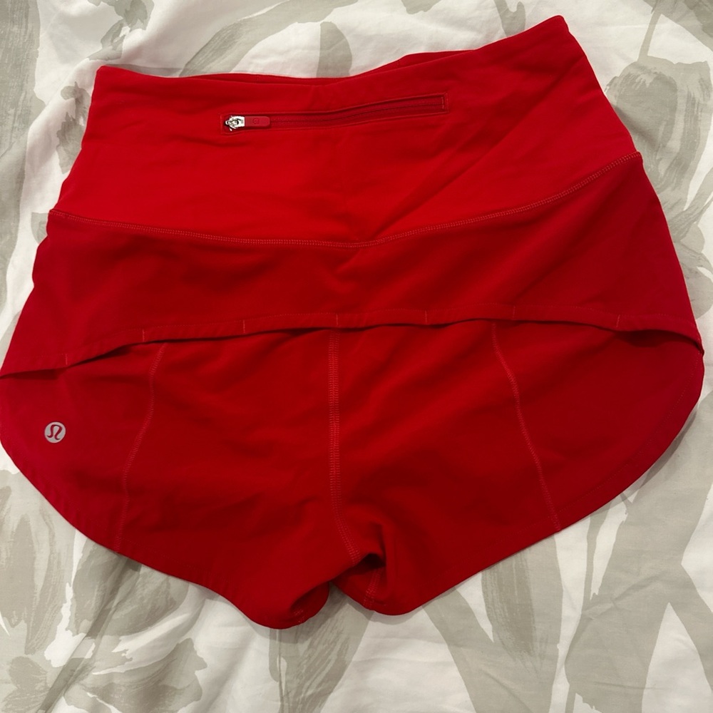 Red lululemon high waisted speed up shorts
